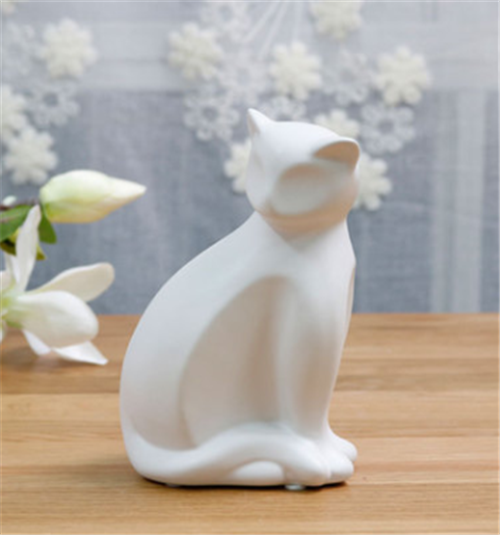 Seated Ceramic Cat — decorative sculpture, view 1