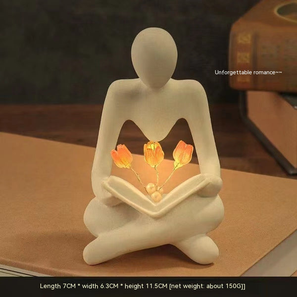 Seated Reader Sculpture — decorative sculpture, view 1